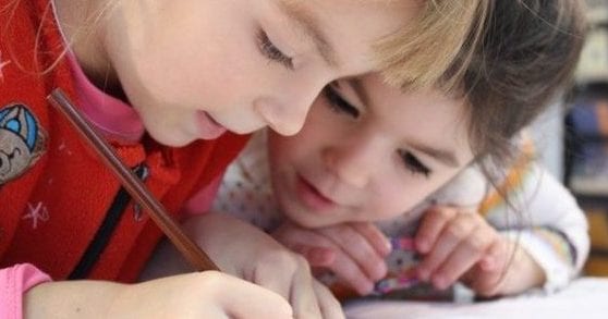 Kids doing homework School board attaches non-compete clause to building sale