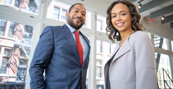 business leaders man woman Continuous improvement key factor to achieving business success