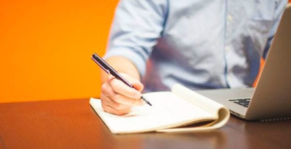 Entrepreneur doing paperwork to manage his business The right legal business structure can save you money and time