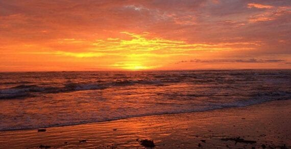 sunset shore nature Strange weather, stranger words to describe it